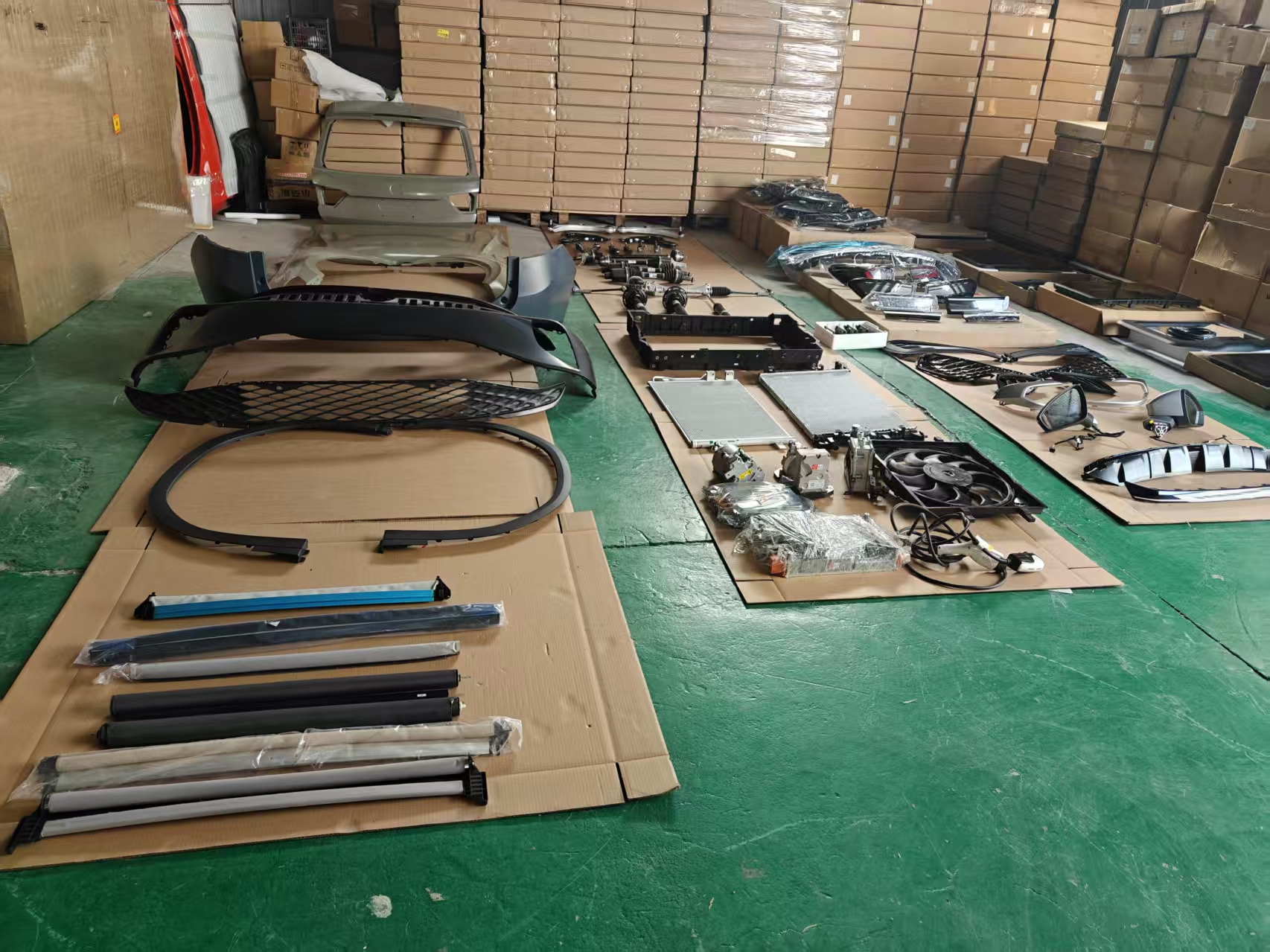 EV body, suspension and cooling parts arranged for checking
