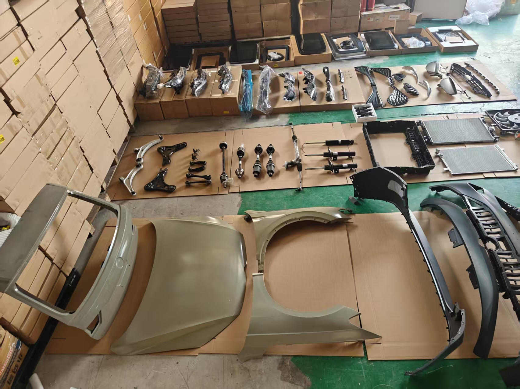 Warehouse stock of EV replacement parts organized before packing